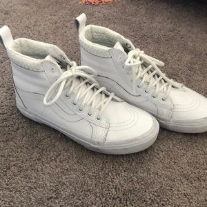 All white leather vans